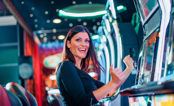 Live dealer at roulette table with spinning wheel visible in high-definition camera feed from harta studio